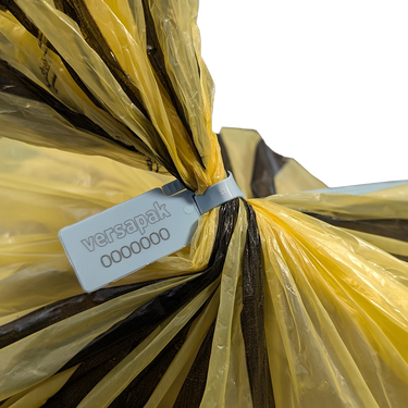 VersaTight in Action on a Clinical Waste Tiger Sack Up Close
